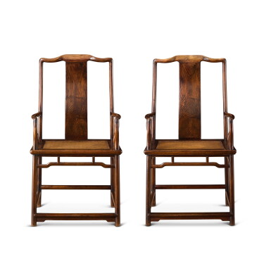View full screen - View 1 of Lot 3763. A pair of huanghuali continuous yokeback armchairs, Ming dynasty, 17th century | 明十七世紀 黃花梨南官帽椅一對.