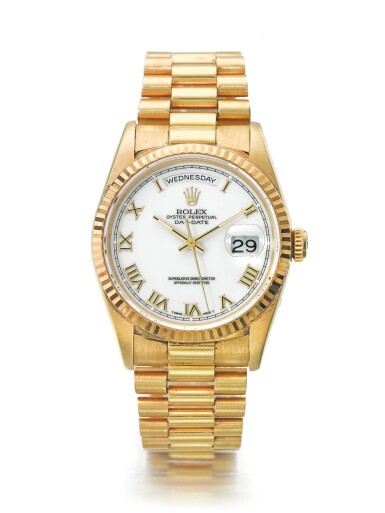 View full screen - View 1 of Lot 69. ROLEX | REF 18238/18200 DAY-DATE, A YELLOW GOLD AUTOMATIC WRISTWATCH WITH DAY, DATE, AND BRACELET CIRCA 1994 .
