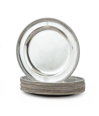 View full screen - View 1 of Lot 86. A set of twelve silver plates engraved with coats-of-arms and crest, Robert Sharp, London, 1789 | Ensemble de douze assiettes en argent gravées d'armoiries et de cimier par Robert Sharp, Londres, 1789.