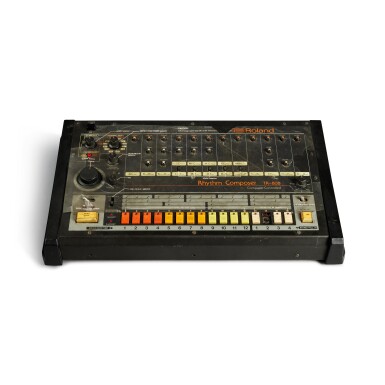 View full screen - View 1 of Lot 9. Roland TR-808 drum machine played on historic first Def Jam single, Jazzy Jay and T La Rock’s “It’s Yours” (1984), with “AFRIKA BAMBAATAA” carved on left side of machine by Afrika Bambaataa.