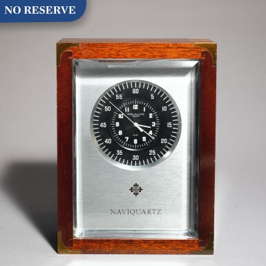 View full screen - View 1 of Lot 56. REFERENCE 1202 NAVIQUARTZ AN ALUMINUM CLOCK, MADE IN 1976.