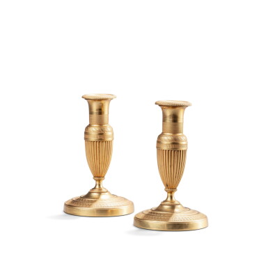 View full screen - View 1 of Lot 186. A pair of Empire gilt-bronze candlesticks, circa 1810.