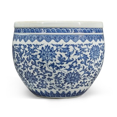 View full screen - View 1 of Lot 74. A blue and white 'floral' fishbowl, Qing dynasty, 18th century | 清十八世紀 青花纏枝蓮紋缸.
