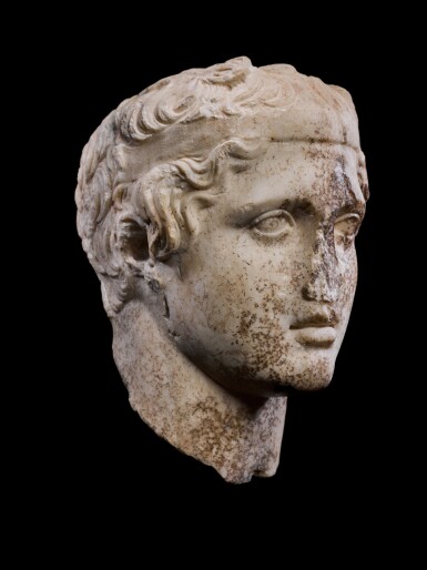 View full screen - View 1 of Lot 7. A Roman Marble Head of Dionysos, circa 1st Century A.D..