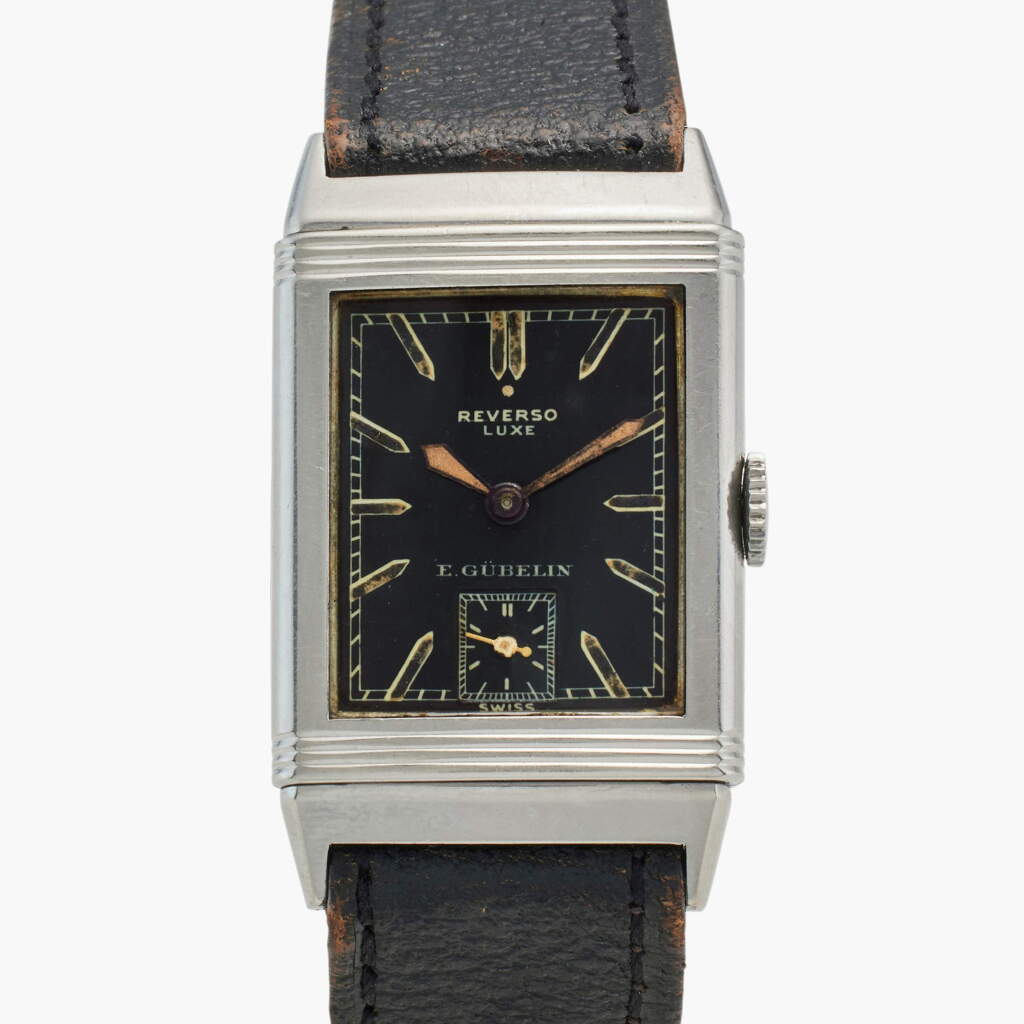View full screen - View 1 of Lot 43. Reverso Luxe | Retailed by E. Gübelin: A stainless steel reversible wristwatch, Circa 1933.