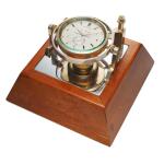 A gilt brass display deck chronometer with 50-hour power reserve indication and a wooden base, Circa 1950