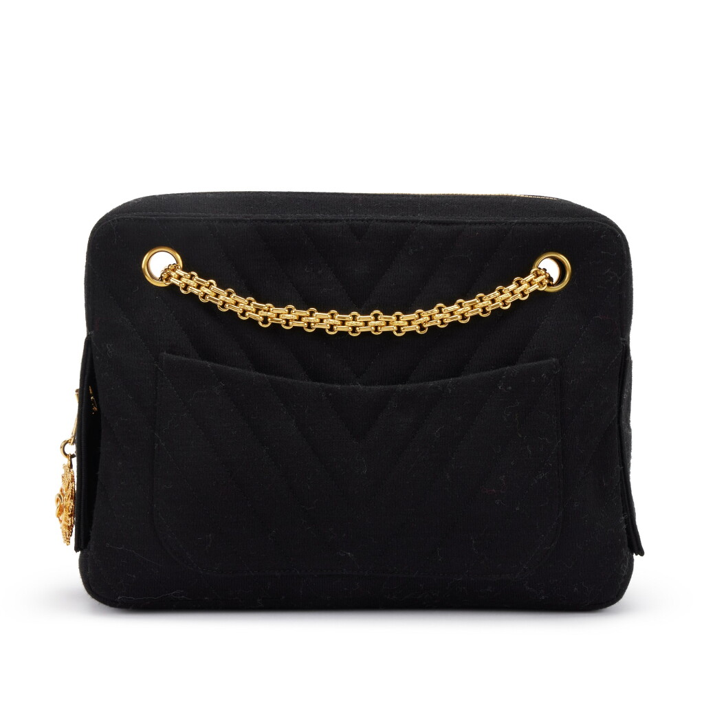 View full screen - View 1 of Lot 155. Black Chevron Quilted Jersey Mademoiselle Camera Bag Gold Hardware, 1994-1996.