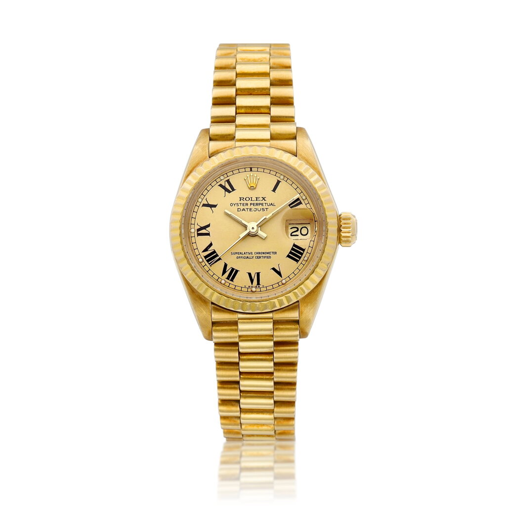 View full screen - View 1 of Lot 8212. DateJust, Reference 6917 | A yellow gold wristwatch with date and bracelet, Circa 1981 | 勞力士 | DateJust 型號6917 | 黃金鏈帶腕錶,備日期顯示,約1981年製.