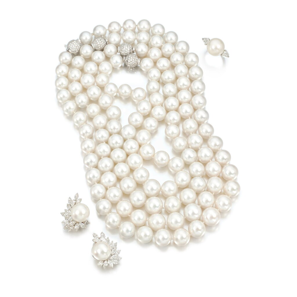 View full screen - View 1 of Lot 871. Collection of cultured pearl and diamond jewels.