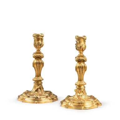 View full screen - View 1 of Lot 116. A pair of Louis XV gilt-bronze candlesticks, marked with the crowned C, circa 1745-1749 | Paire de flambeaux en bronze doré d'époque Louis XV, au C couronné, vers 1745-1749.