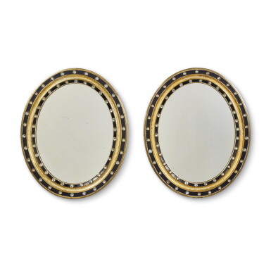 View full screen - View 1 of Lot 458. A Matched Pair of Irish Ebonized and Parcel-Gilt Mirrors, Late 19th Century.