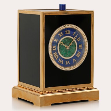 View full screen - View 1 of Lot 110. An exceptional 18ct yellow gold, silver, onyx, jade, lapis lazuli, agate and enamel minute repeating 8-day Cube Clock | Nos. 2320, 4020 | Circa 1925.