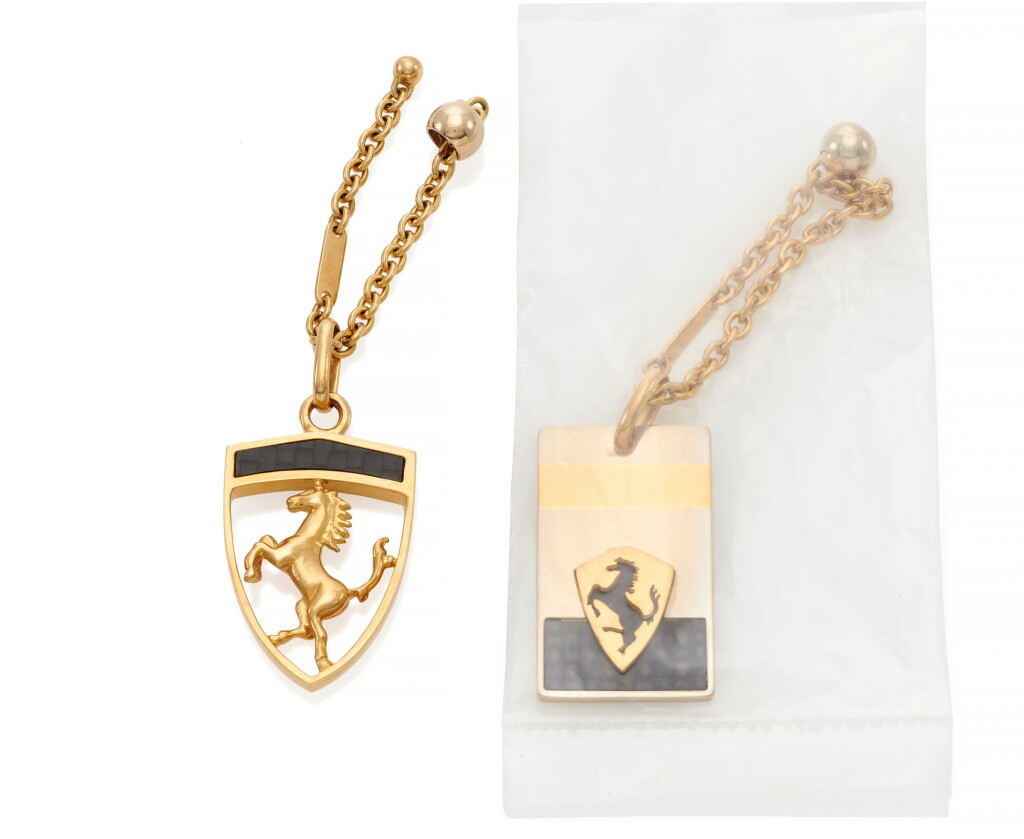 View full screen - View 1 of Lot 147. TWO PENDANT/ KEYCHAINS (DUE PENDENTI/PORTACHIAVI) | FERRARI.
