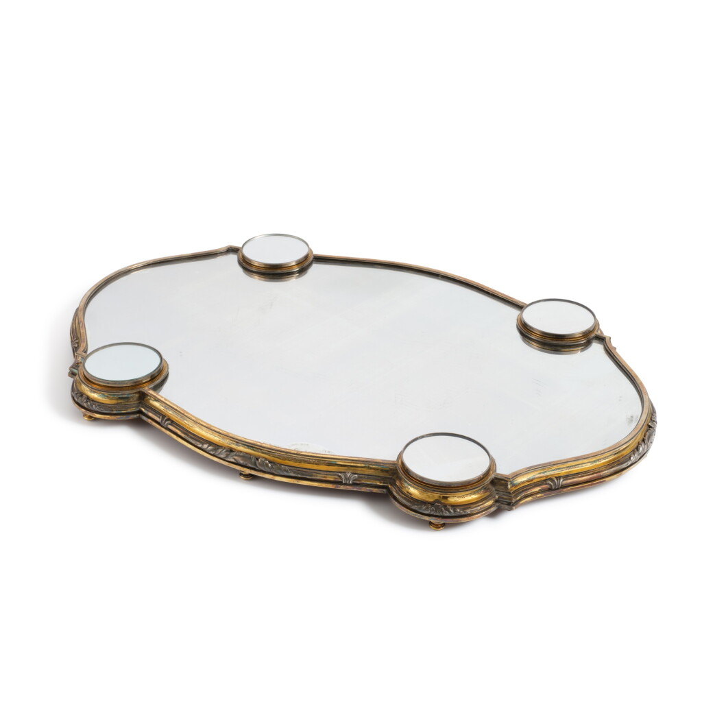 View full screen - View 1 of Lot 847. A French parcel-gilt silver and silver-plate mirror plateau, circa 1900, by G. Keller, Paris.