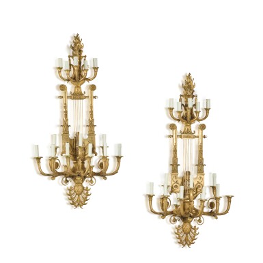 View full screen - View 1 of Lot 59. A pair of Empire style gilt-bronze sixteen-light wall appliques.
