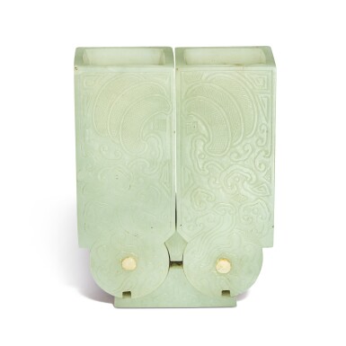 View full screen - View 1 of Lot 100. A rare archaistic pale celadon jade fitting, Qing dynasty, 19th century | 清十九世紀 青白玉仿古紋擺件.