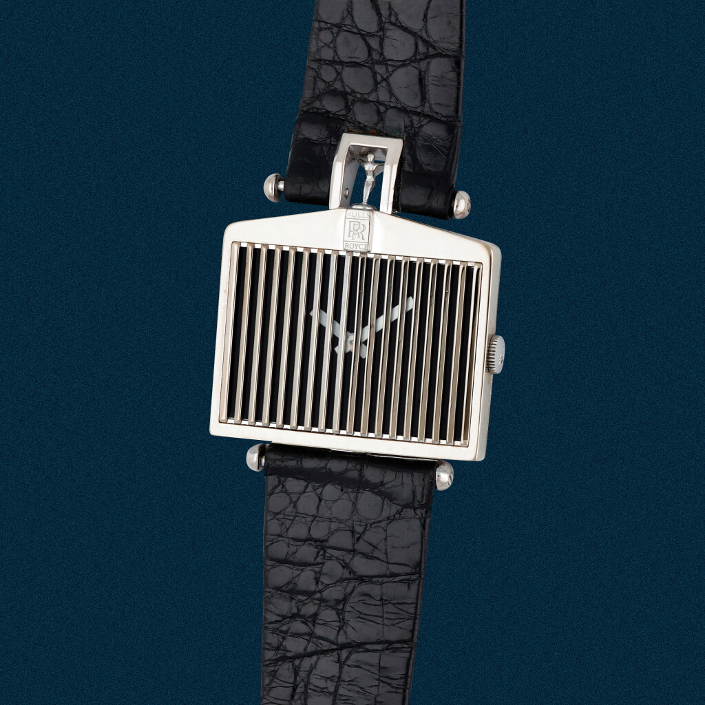 View full screen - View 1 of Lot 15. Reference 55585 | A white gold Rolls Royce car-shaped wristwatch | Circa 1980 .