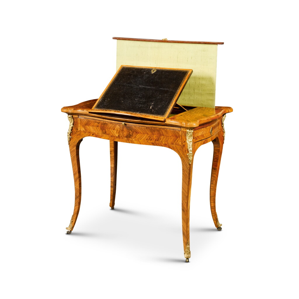 View full screen - View 1 of Lot 182. A Louis XV kingwood and parquetry table liseuse stamped Migeon, mid 18th century.