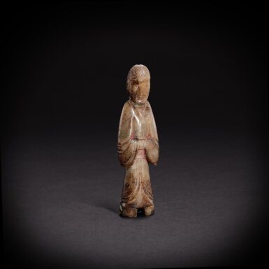 View full screen - View 1 of Lot 6848. An extremely rare white and russet jade figure of a court lady, Han dynasty | 漢 白玉仕女立像.