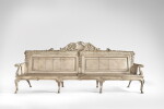 A George II Gray-Painted Oak Hall Settee in the manner of William Kent, Circa 1740