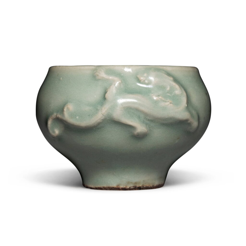 View full screen - View 1 of Lot 248. A 'Longquan' celadon-glazed 'dragon' cup, Southern Song dynasty | 南宋 龍泉窰青釉龍紋盃.