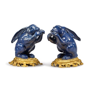 View full screen - View 1 of Lot 412. A Pair of Chinese Blue Porcelain Hares on Louis XV Style Gilt Bronze Mounts, 19th Century.