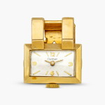 New York retailed | Clip de Revers | A yellow gold lapel clip watch with movement by James Schulz, Circa 1945