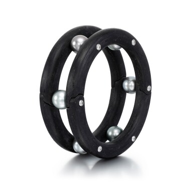 View full screen - View 1 of Lot 1046. Carbon fibre, white gold, grey pearl and diamond bracelet .