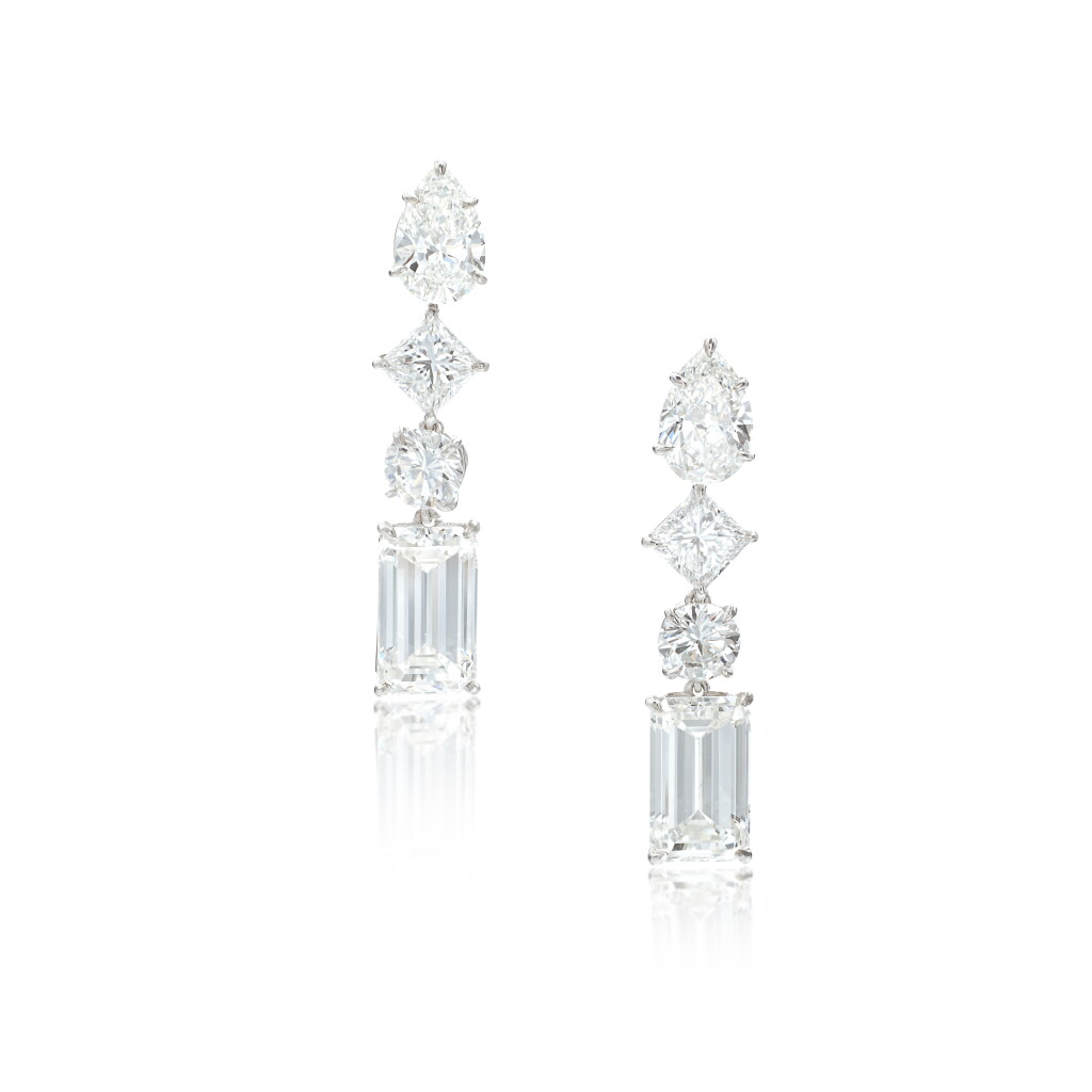 View full screen - View 1 of Lot 560. Pair of diamond pendent ear clips.