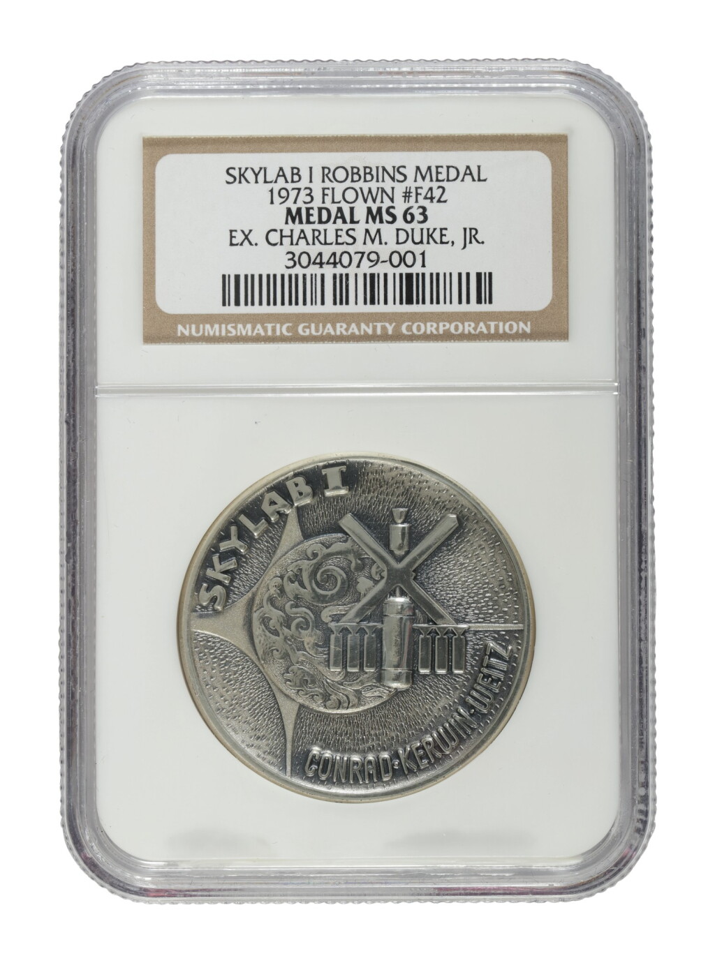 View full screen - View 1 of Lot 214. FLOWN ON SKYLAB I (SL-2). APOLLO ASTRONAUT CHARLES DUKE'S SKYLAB I SILVER ROBBINS MEDALLION.