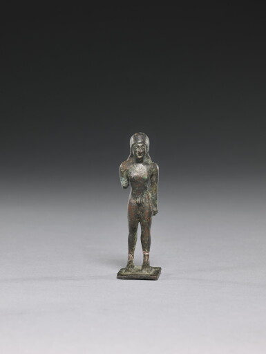 View full screen - View 1 of Lot 14. A GREEK BRONZE FIGURE OF A KOUROS, 2ND HALF OF THE 6TH CENTURY B.C..