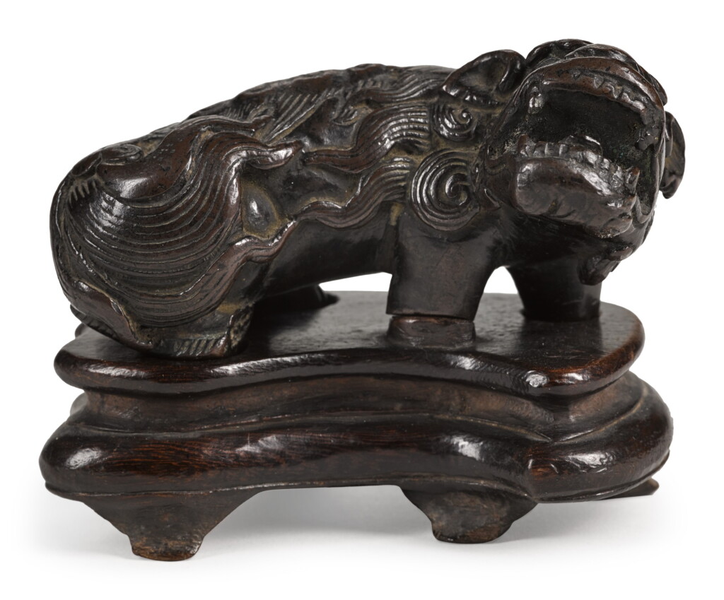 View full screen - View 1 of Lot 69. A BRONZE 'LION' PAPERWEIGHT | 17TH CENTURY | 十七世紀 銅瑞獅鎮紙.