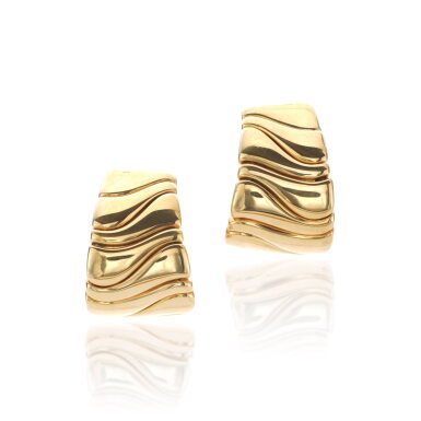 View full screen - View 1 of Lot 956. Pair of gold and steel earrings.