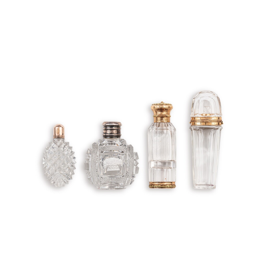 View full screen - View 1 of Lot 603. A group of four gold-mounted crystal scent bottles, Paris, 19th century and later.