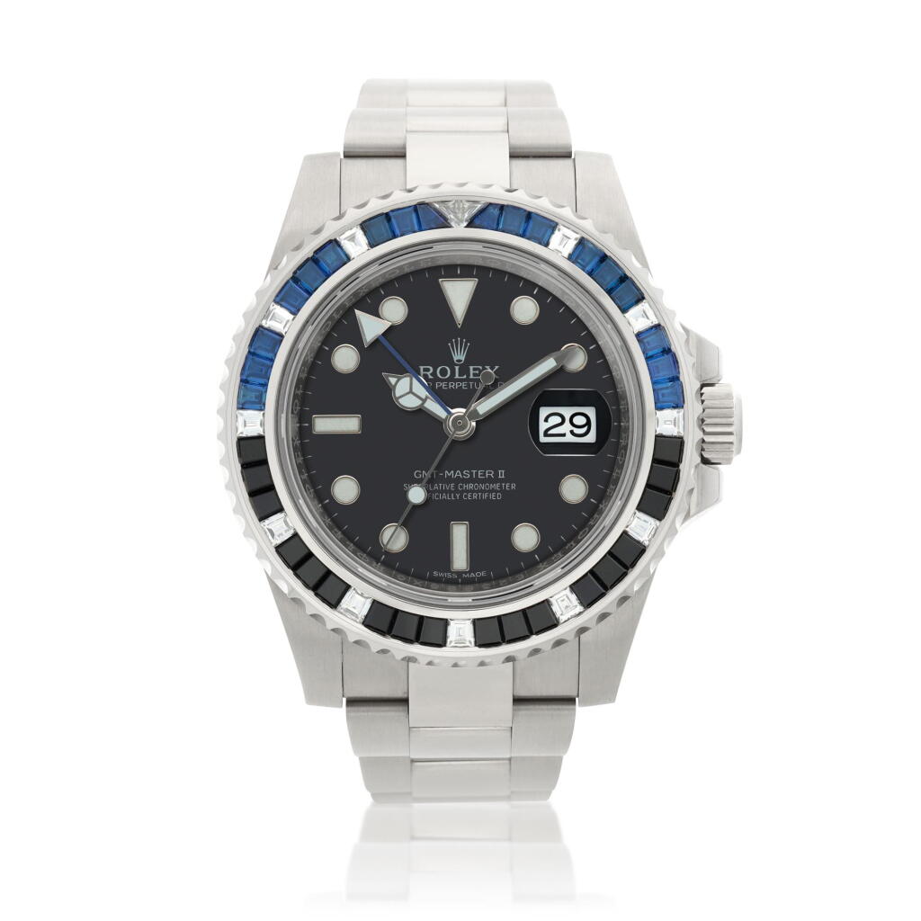 View full screen - View 1 of Lot 42. Reference 116749 GMT-Master II, A white gold, sapphire and diamond-set automatic dual time wristwatch with date and bracelet, Circa 2018.