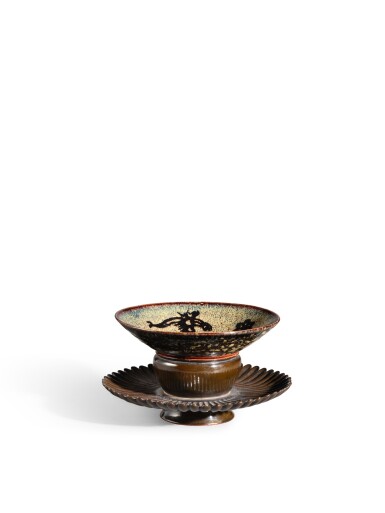 View full screen - View 1 of Lot 2026. A Jizhou 'papercut' 'phoenix' tenmoku bowl, Southern Song dynasty | 南宋 吉州窰剪紙貼花鳳紋天目茶盞.