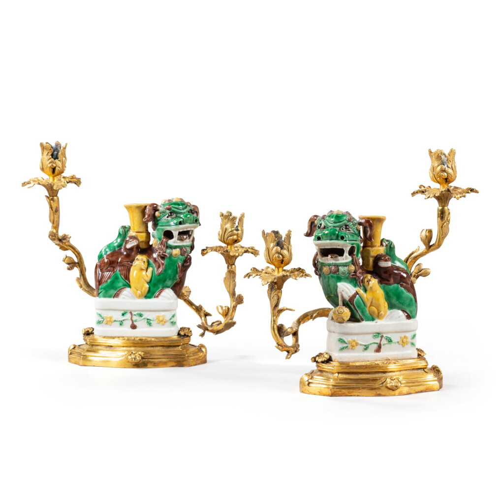 View full screen - View 1 of Lot 731. A pair of gilt-bronze Chinese porcelain twin-light candelabra, the porcelain Kangxi period (1662-1722), the mounts Louis XV style, second half 19th century.