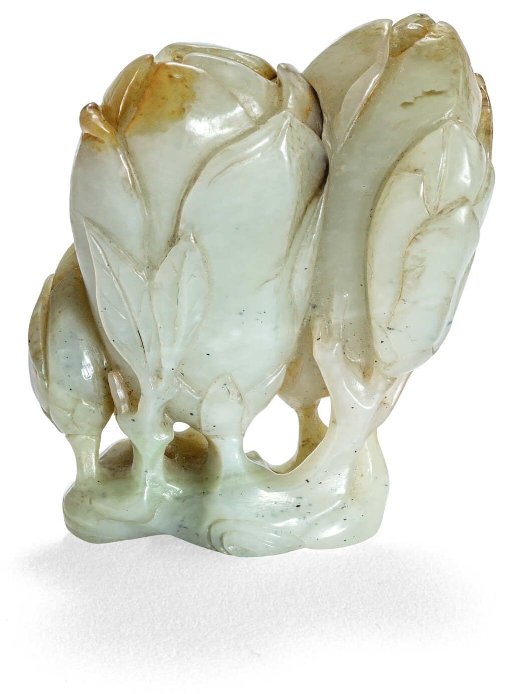 View full screen - View 1 of Lot 27. GROUPE EN JADE CÉLADON DYNASTIE QING, XIXE SIÈCLE | 清十九世紀 青白玉玉蘭花把件 | A celadon jade 'magnolia' carving , Qing Dynasty, 19th century.