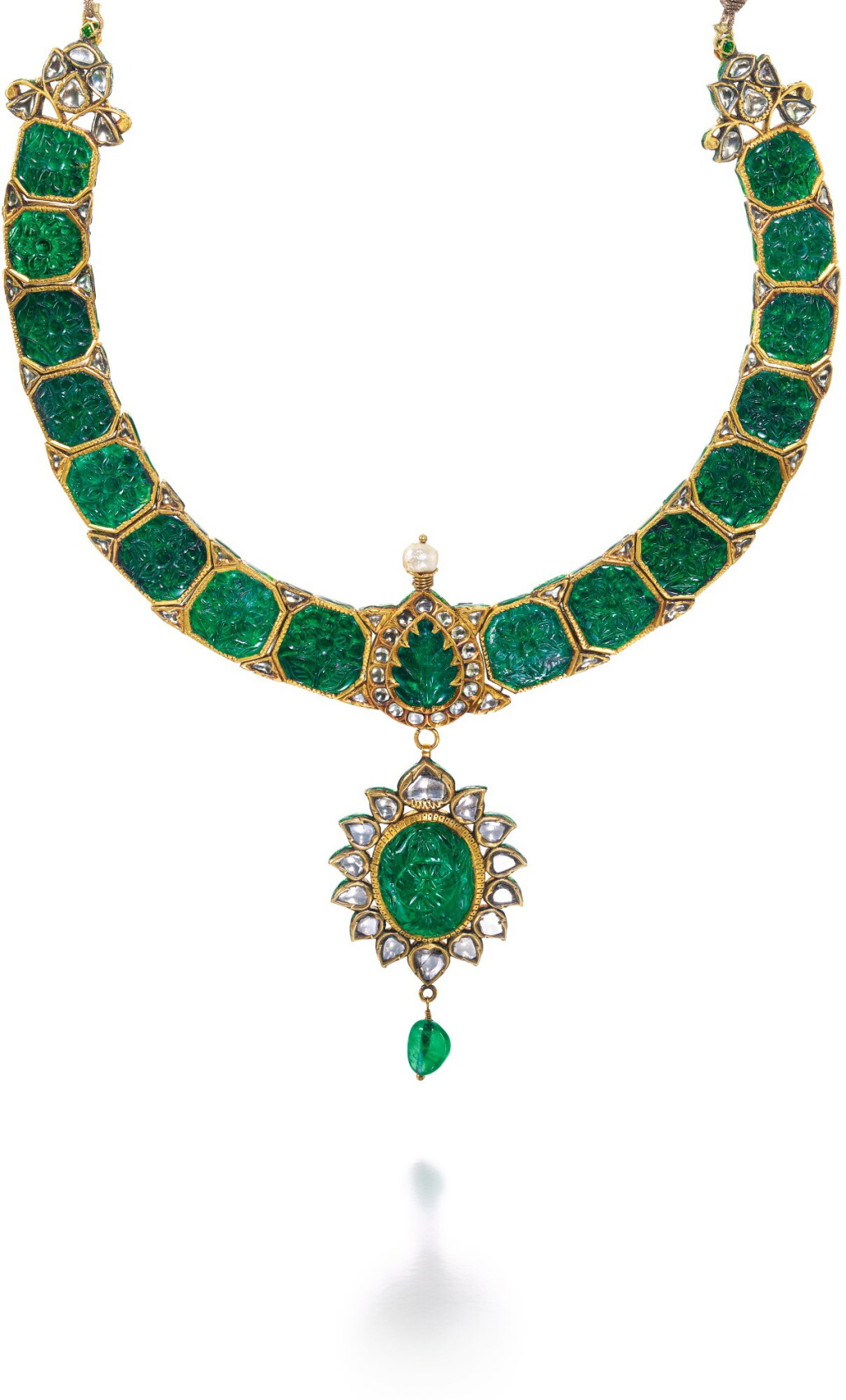 View full screen - View 1 of Lot 262. A CARVED EMERALD AND DIAMOND-SET NECKLACE WITH GREEN ENAMEL, NORTH INDIA, CIRCA 1900 .