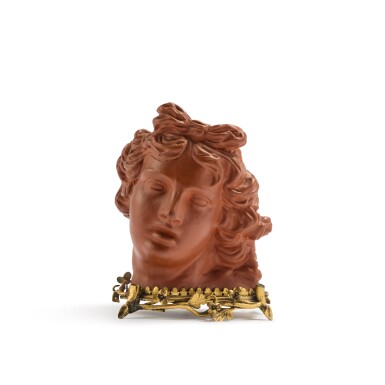 View full screen - View 1 of Lot 24. A Rare Böttger Stoneware Model of the Head of Apollo, Circa 1710-13, with later gilt-metal mount.