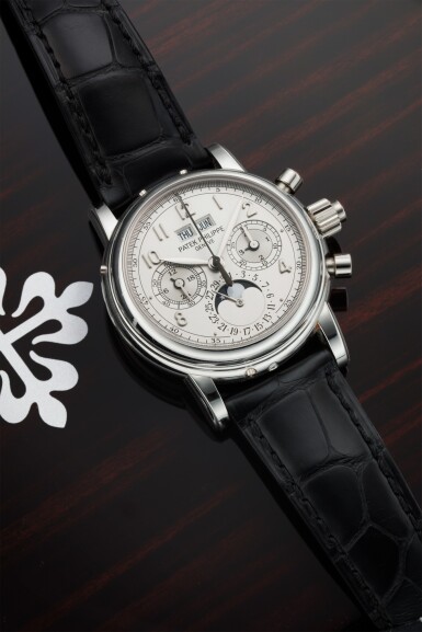 View full screen - View 1 of Lot 176. REFERENCE 5004P A FINE PLATINUM PERPETUAL CALENDAR SPLIT-SECONDS CHRONOGRAPH WRISTWATCH WITH MOON PHASES, 24 HOURS, AND LEAP YEAR INDICATION, CIRCA 2015.