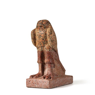 View full screen - View 1 of Lot 52. Egyptian red Aswan granite Horus falcon, Ptolemaic period, 305 - 30 B.C. | Faucon d'Horus en granite rouge d'Assouan, art égyptien, Epoque ptolémaïque, 305-30 avant J.-C. .