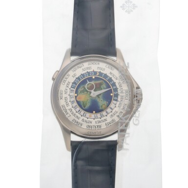 View full screen - View 1 of Lot 141. World time, Ref. 5131G-001 Sealed white gold world time wristwatch with cloisonné enamel dial depicting Europe, Asia, Africa and Oceania Circa 2012 | 百達翡麗 | 5131G-001型號「World time」白金世界時間腕錶備亞非歐及大洋洲圖案掐絲琺瑯錶盤,連密封包裝,年份約2012.