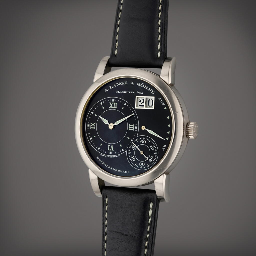 View full screen - View 1 of Lot 245. Reference 101.029 Lange 1 Luminous | A white gold wristwatch with digital date display and power reserve indication, Circa 2004.