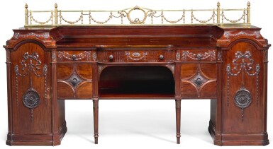 View full screen - View 1 of Lot 87. A LARGE EDWARDIAN CARVED MAHOGANY SIDEBOARD BY WARING AND GILLOW, EARLY 20TH CENTURY, IN THE MANNER OF ROBERT ADAM.