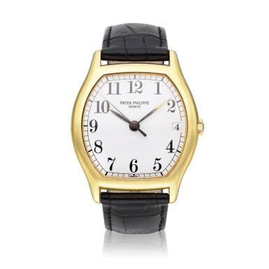 View full screen - View 1 of Lot 94. Reference 5030 Gondolo | A yellow gold tonneau shaped automatic wristwatch with date, Circa 1995.