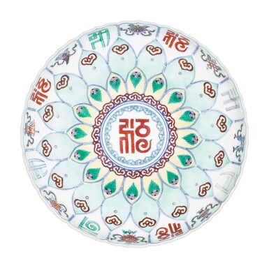 View full screen - View 1 of Lot 35. A rare doucai moulded 'lotus' dish, Mark and period of Yongzheng | 清雍正 鬪彩八吉祥模印蓮式盤 《大清雍正年製》款.