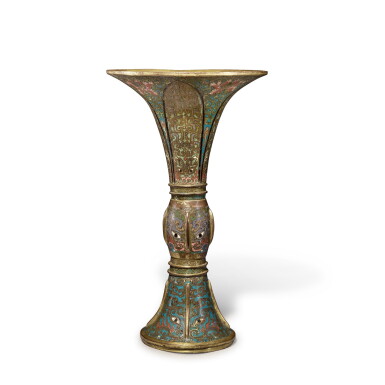 View full screen - View 1 of Lot 242. A cloisonné enamel 'taotie' gu-shaped vase, Qing dynasty, Qianlong period | 清乾隆 銅胎掐絲琺瑯仿古饕餮紋出戟花觚.