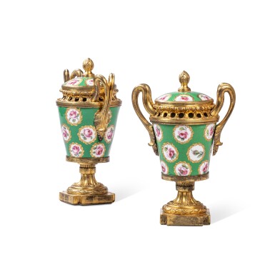 View full screen - View 1 of Lot 415. A pair of Louis XV gilt-bronze mounted Sèvres porcelain vases as pots-pourris, circa 1770.