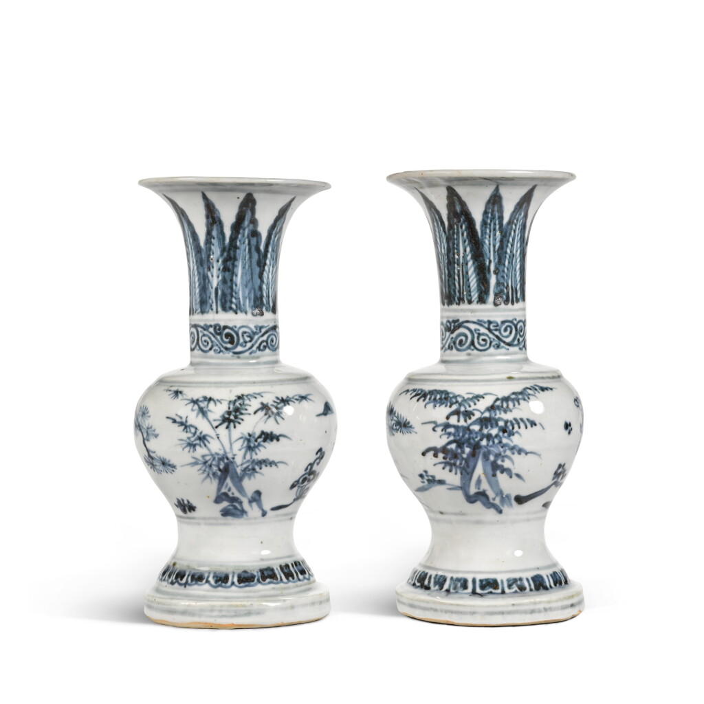 View full screen - View 1 of Lot 374. A pair of blue and white 'three friends of winter' gu-form vases, Ming dynasty, 16th / 17th century| 明十六 / 十七世紀 青花歲寒三友圖花觚一對.